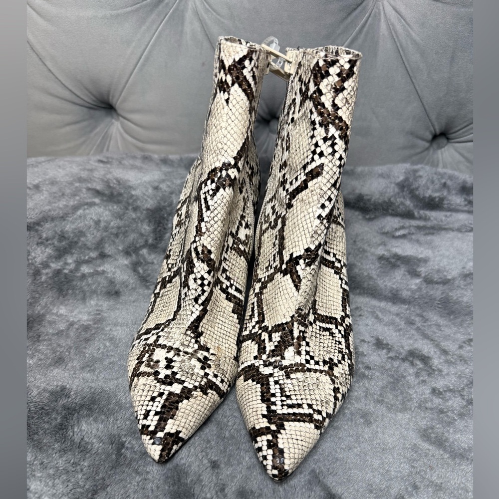 Thalia Sodi Rylie pointed-toe ankle boots‎ in a snakeskin print.